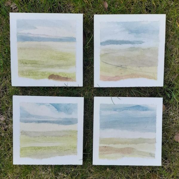 Gently Rolls the Landscape under a Blue Wood Sky